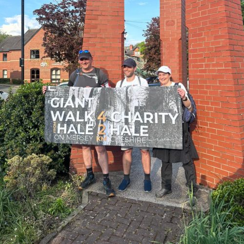 Giant Walk 2025 finishers with leader Marc Duschenes