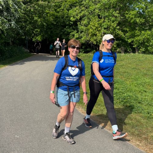 Giant Walkers trekking through Hale on Mersey