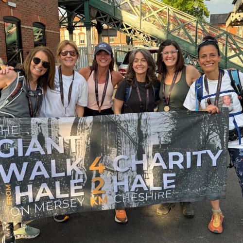 5068c115-68d0-4b94-9adb-1215fb7660b9 2 Walkers celebrating after crossing the Giant Walk finish line in Hale (Manchester) 2025