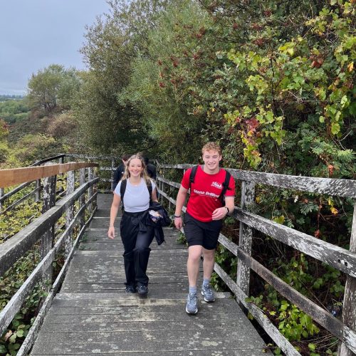 Trekkers walking across Hale on Mersey bridge on the Giant Walk for CRY 2025.