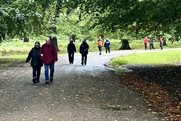 Trekkers walking through Dunham Massey on the Giant Walk for CRY 2025.