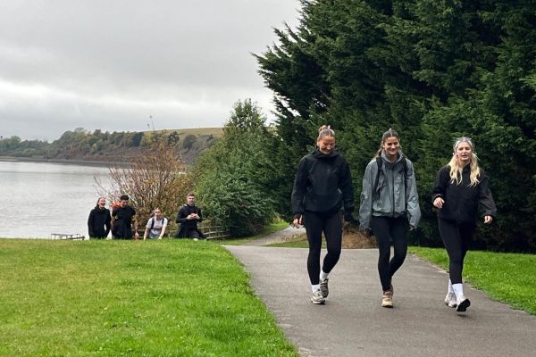 Trekkers walking through Hale on Mersey on the Giant Walk for CRY 2025.