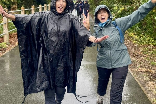 Giant Walkers in the rain on the marathon for CRY 2025.