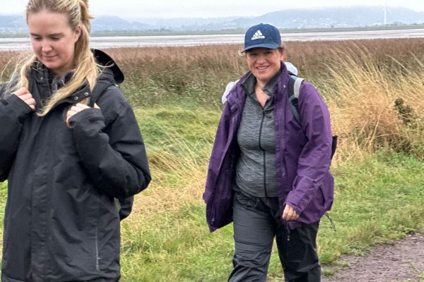 Trekkers walking through Hale on Mersey on the Giant Walk for CRY 2025.