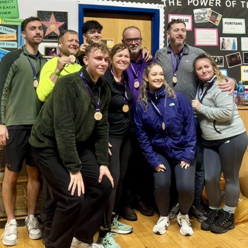 Trekkers celebrating with their medal at the end of the Giant Walk for CRY 2025. Hale2Hale.