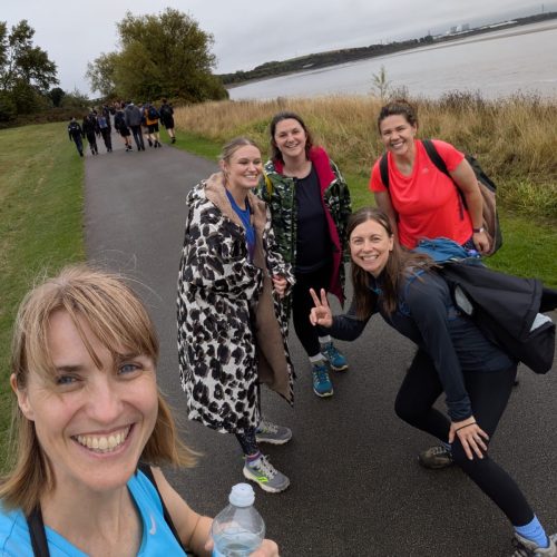 Trekkers walking through Hale on Mersey on the Giant Walk for CRY 2025.