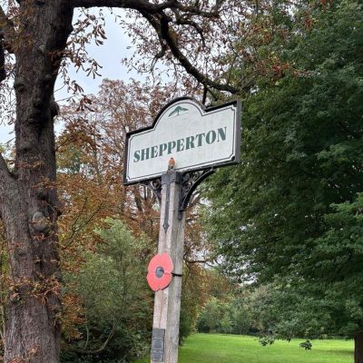 Shepperton sign and remembrance poppy